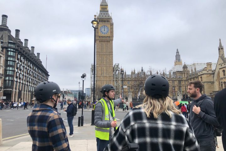 a group of people standing in front of a building
