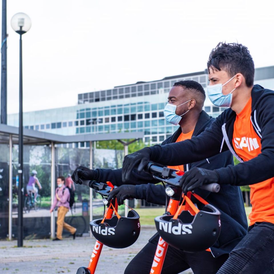 a man riding on the back of a motorcycle