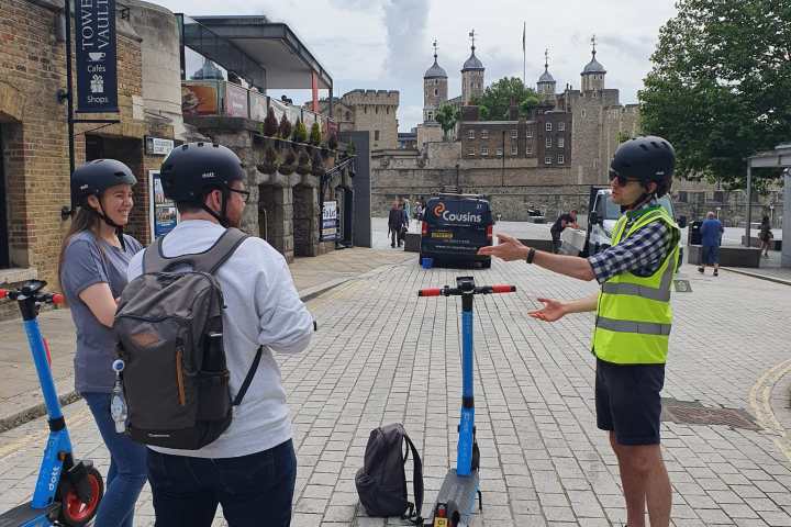 a group of people standing in front of a building