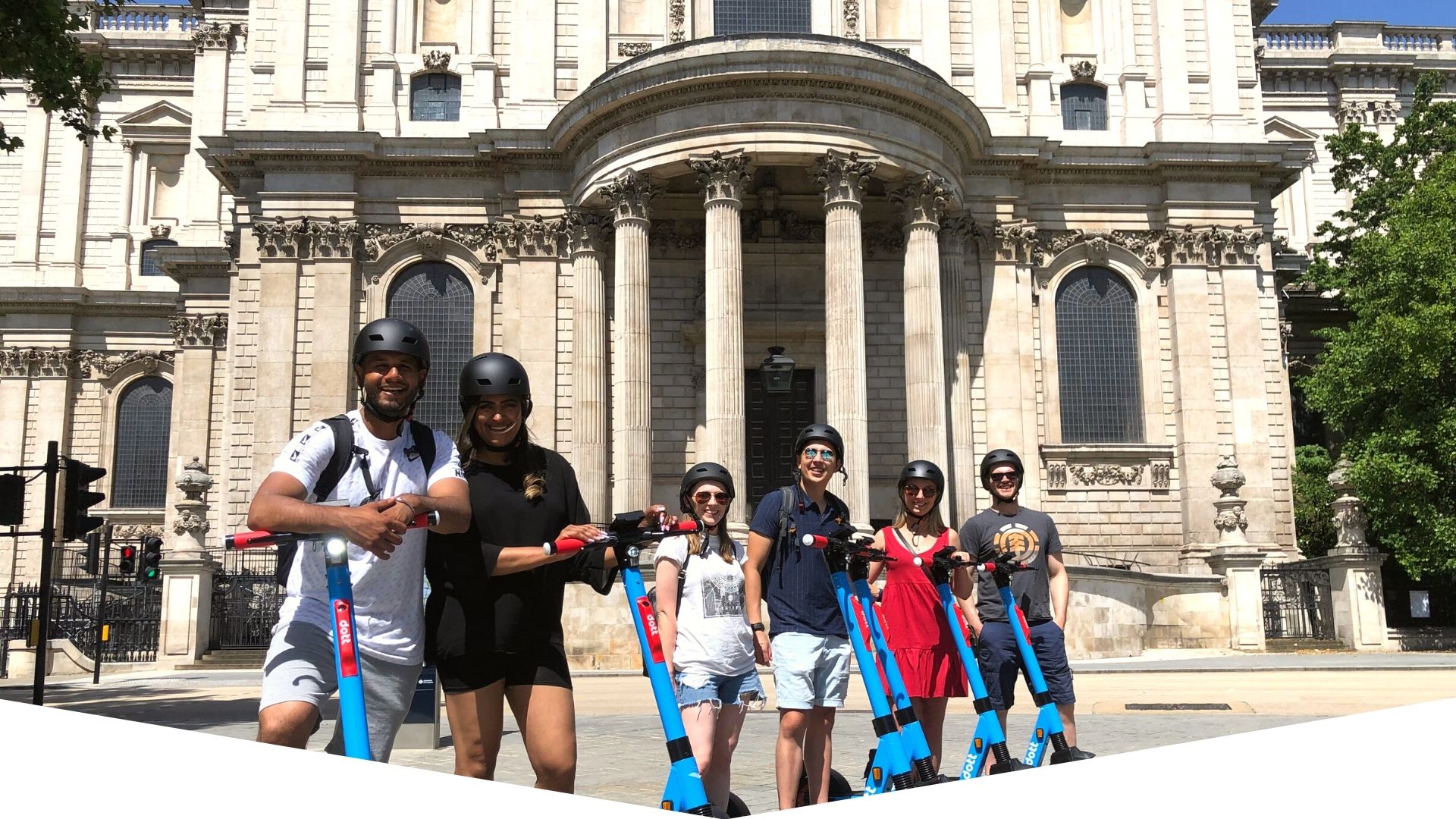 a group of people standing in front of a building