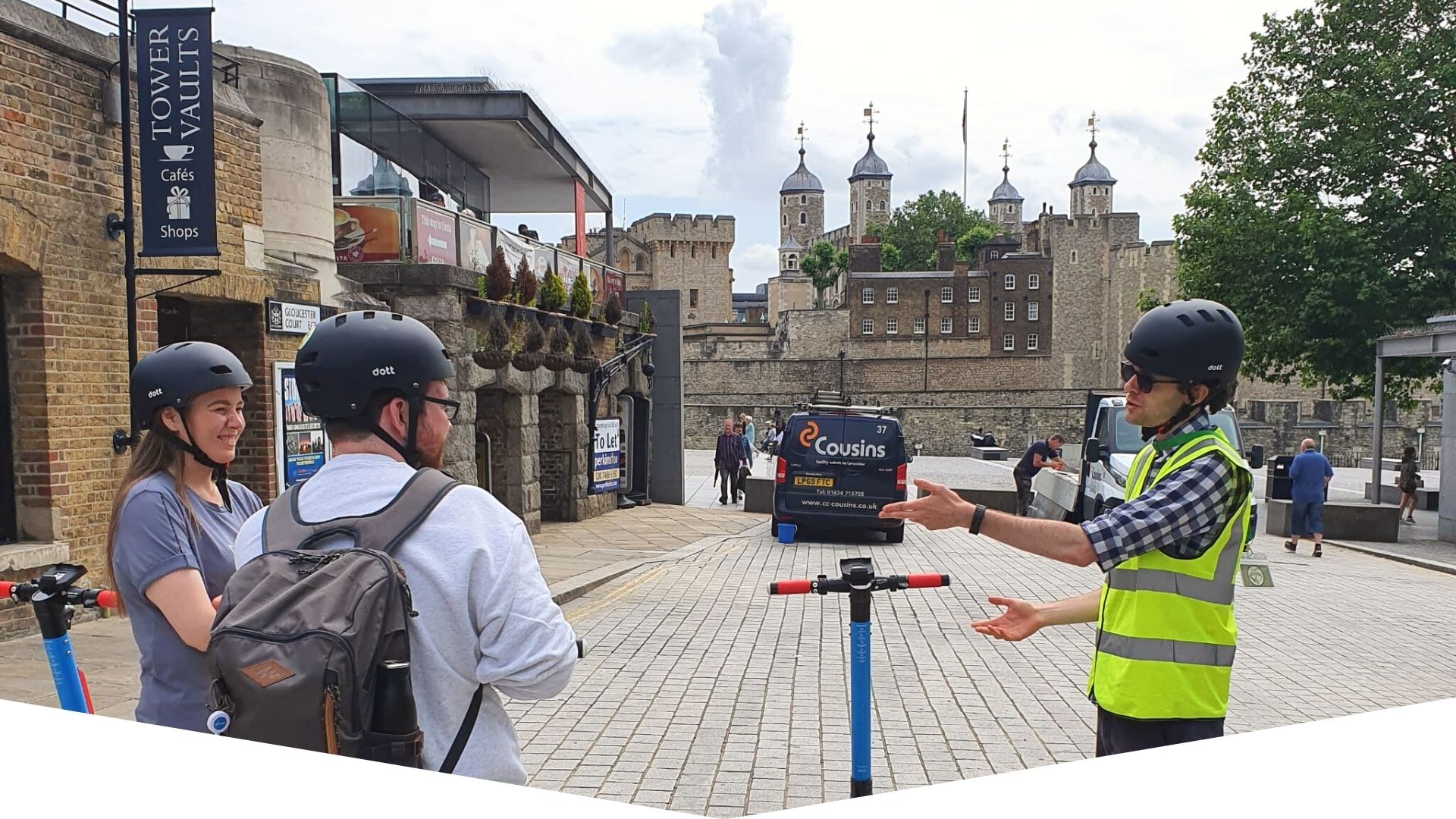 a group of people on a sidewalk