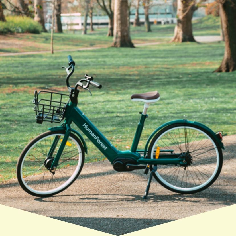 a bicycle parked on a sidewalk