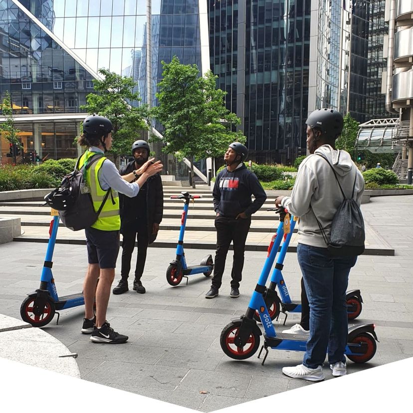 a group of people on a city street