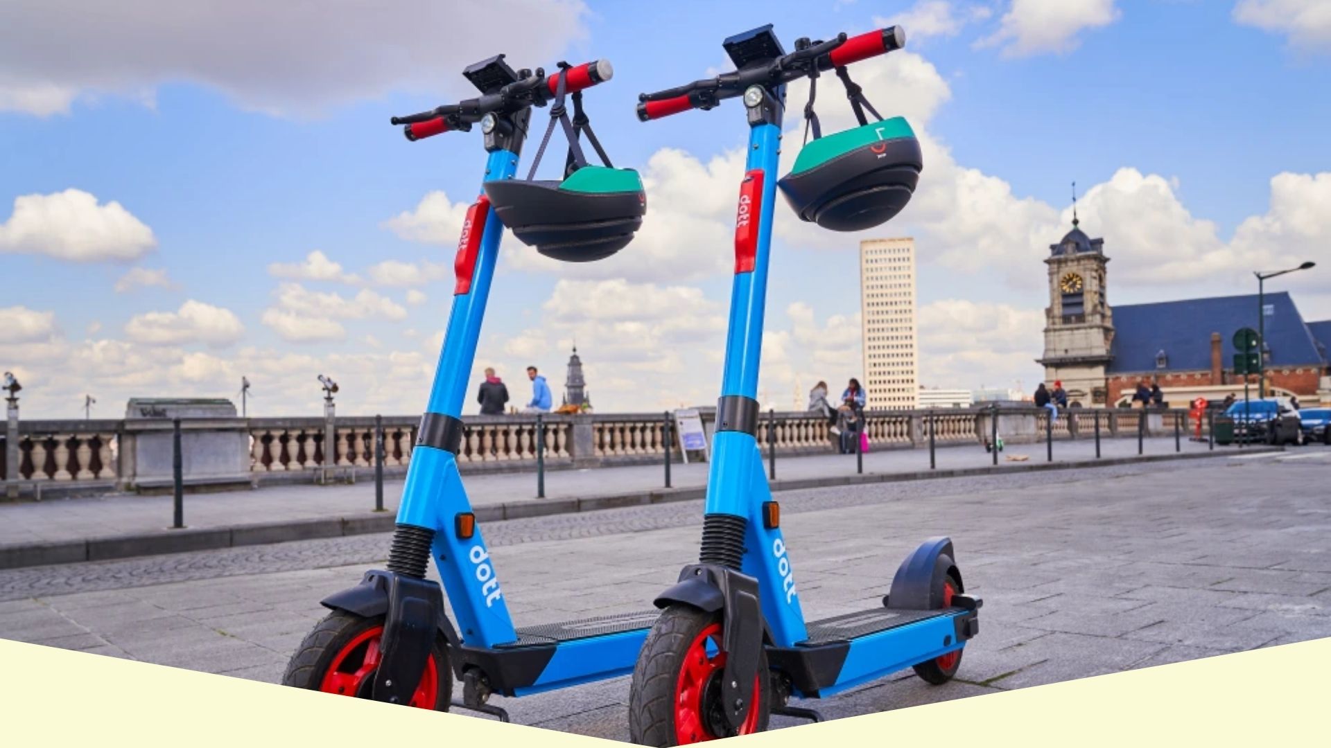 a group of people sitting in a parking lot