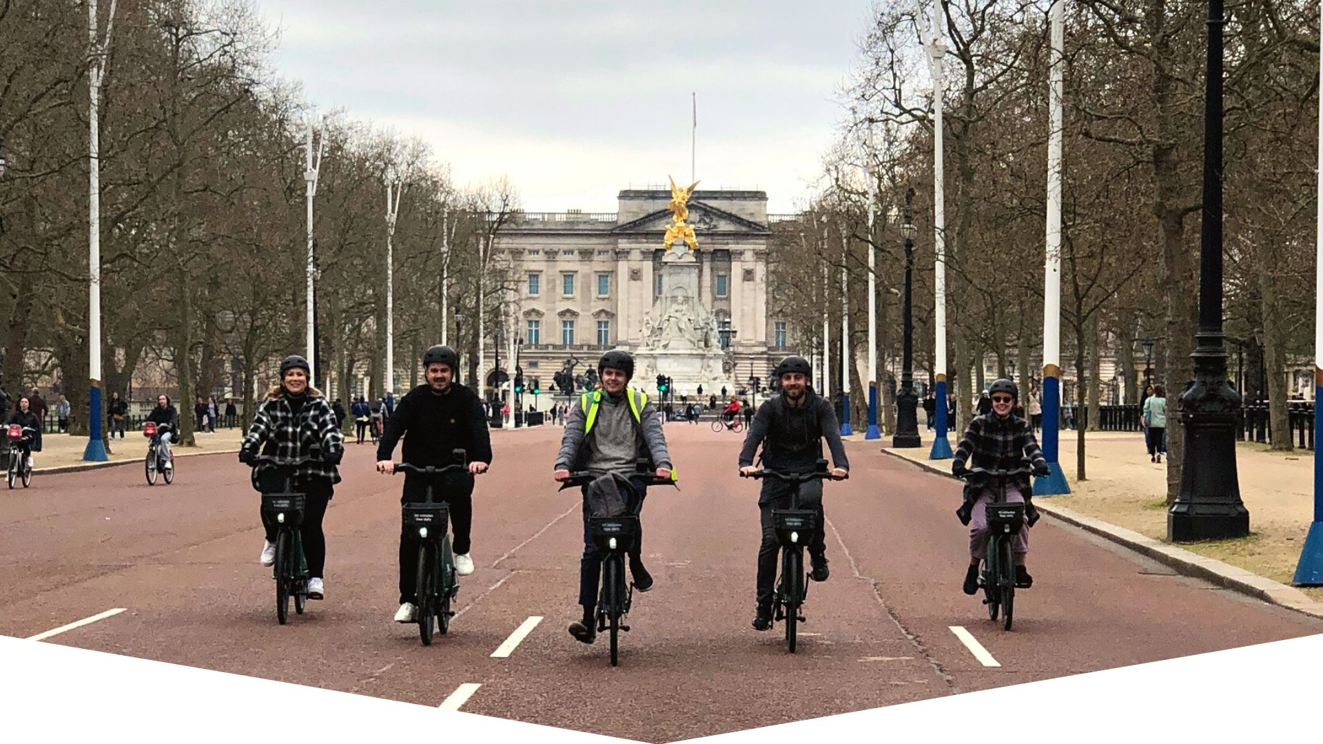 a group of people walking down the street