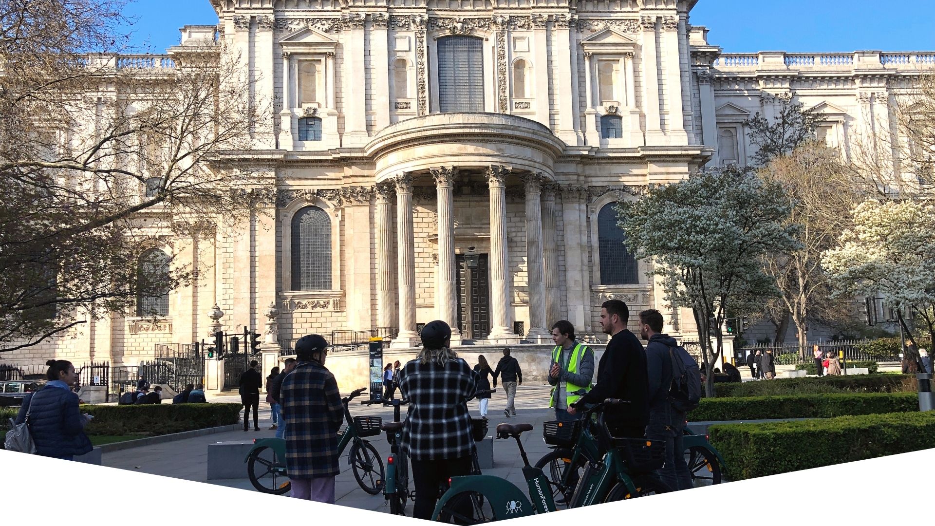 a group of people in front of a building