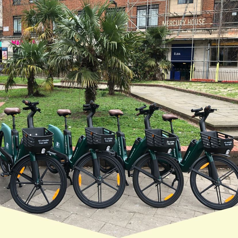 a bicycle parked on the side of a building