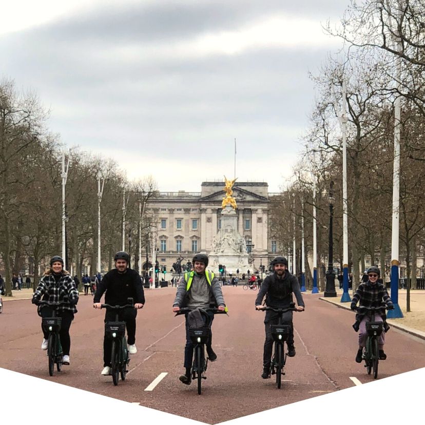 a group of people walking down the street