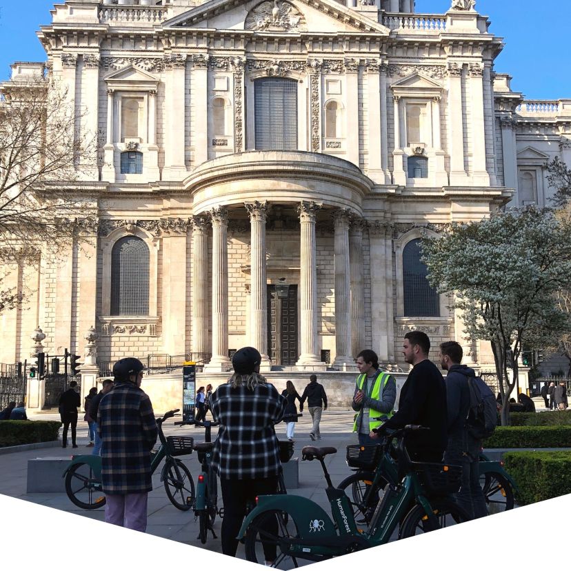 a group of people standing in front of a building